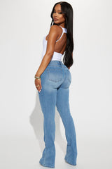 Jessie Mid Rise Distressed Bootcut Jean - Light Blue Wash