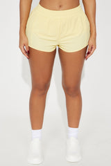 Last Serve Active Running Short - Butter Yellow